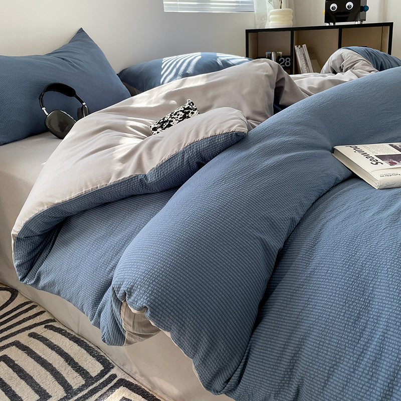 Elegant blue and gray bedding with soft textured fabric design