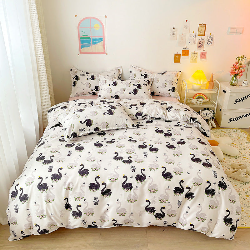 Elegant white bedding featuring black and grey swan patterns