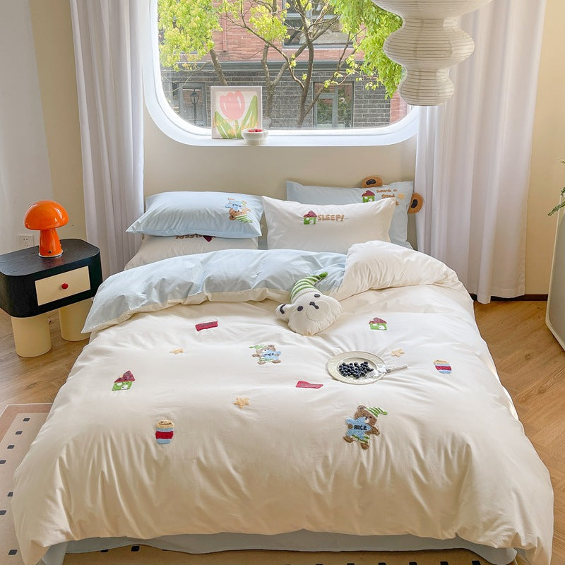 Cozy bedding with cute bear embroidery and playful "SLEEP!" text