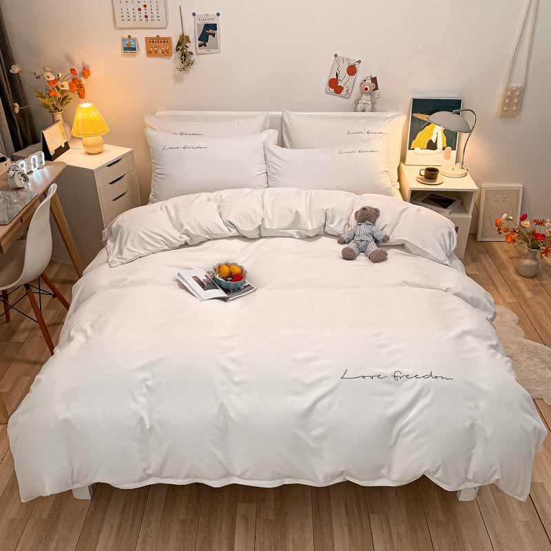 Luxurious cotton bedding set on a cozy bed