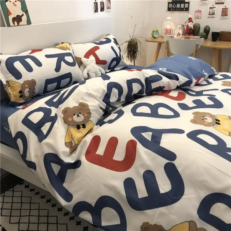 Bear-themed bedding set with large colorful letters and playful design