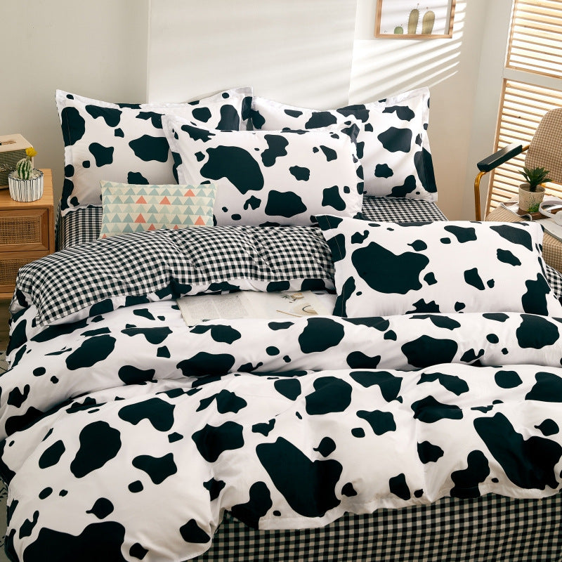 Stylish black and white cow print bedding set with pillows