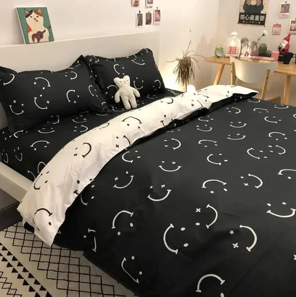 Fun black bedding set with smiley faces and white accents