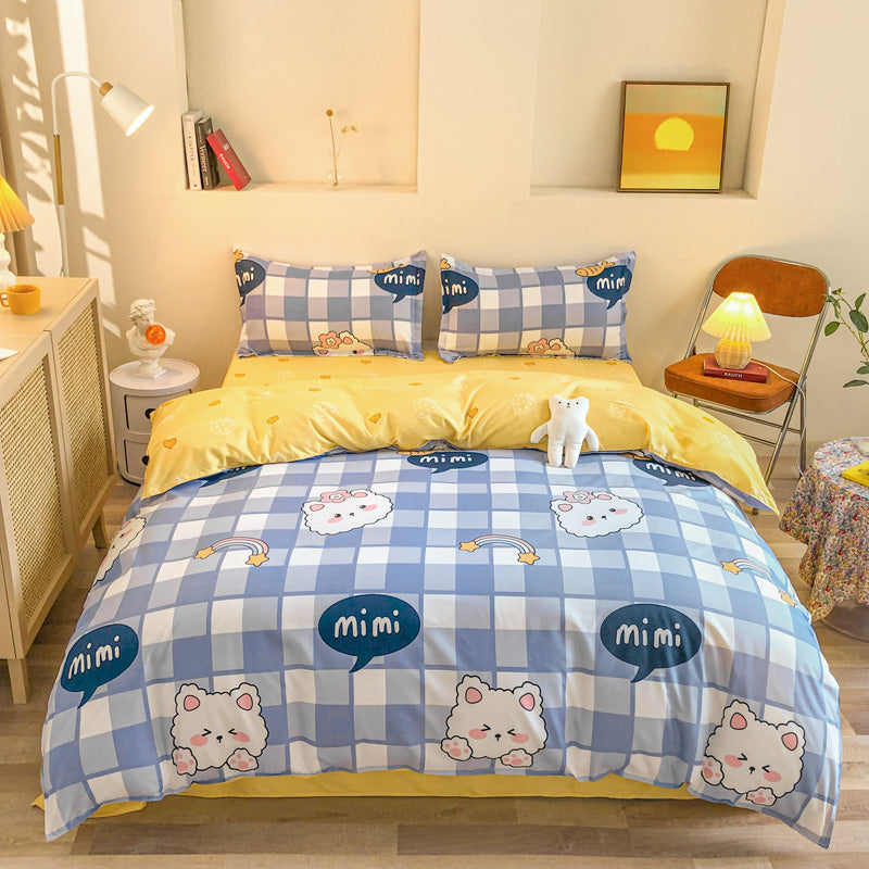 Playful blue and yellow bedding set with cat and checkered design