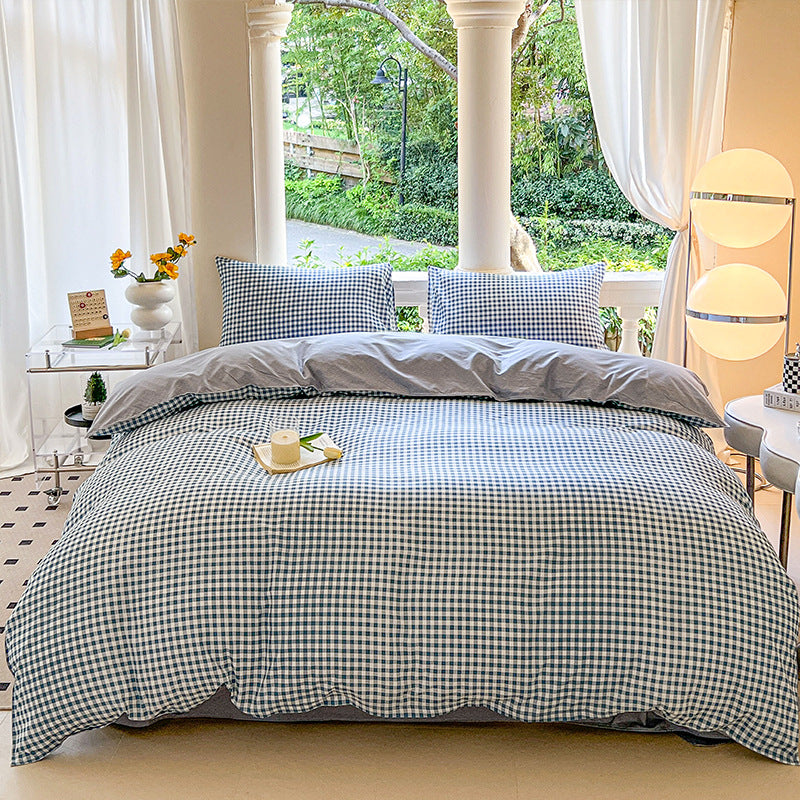 Blue checkered bedding set with matching pillows and fresh design