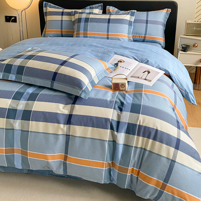 Stylish blue plaid bedding set with white and orange accents