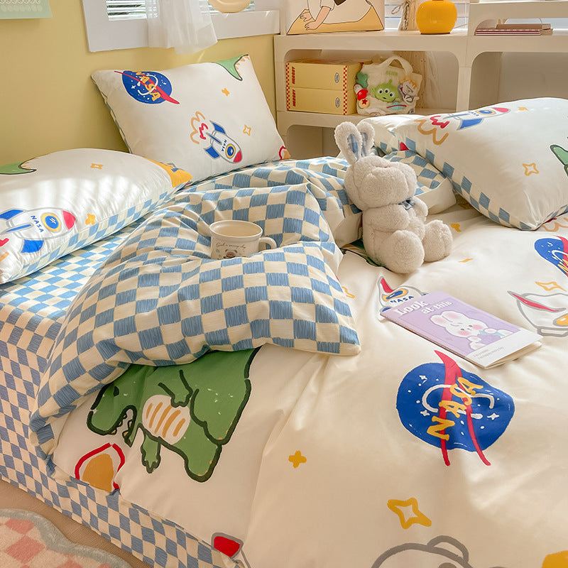 Fun space-themed bedding set with rockets and checkered pattern