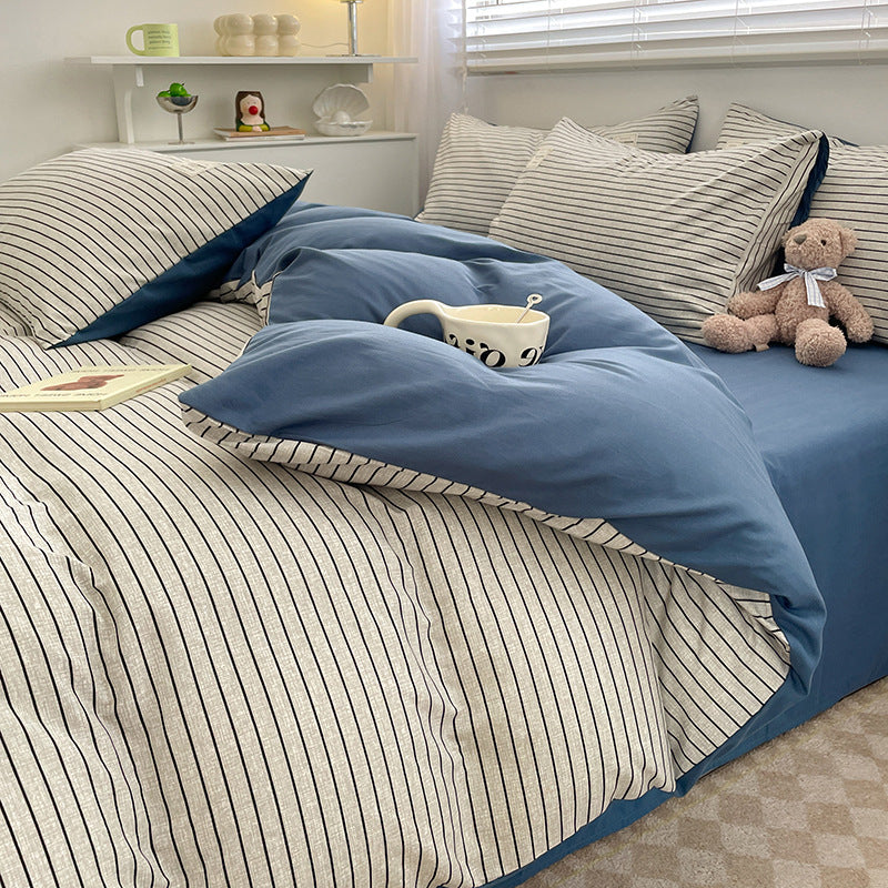 Cozy bedding set with blue and striped pillowcases