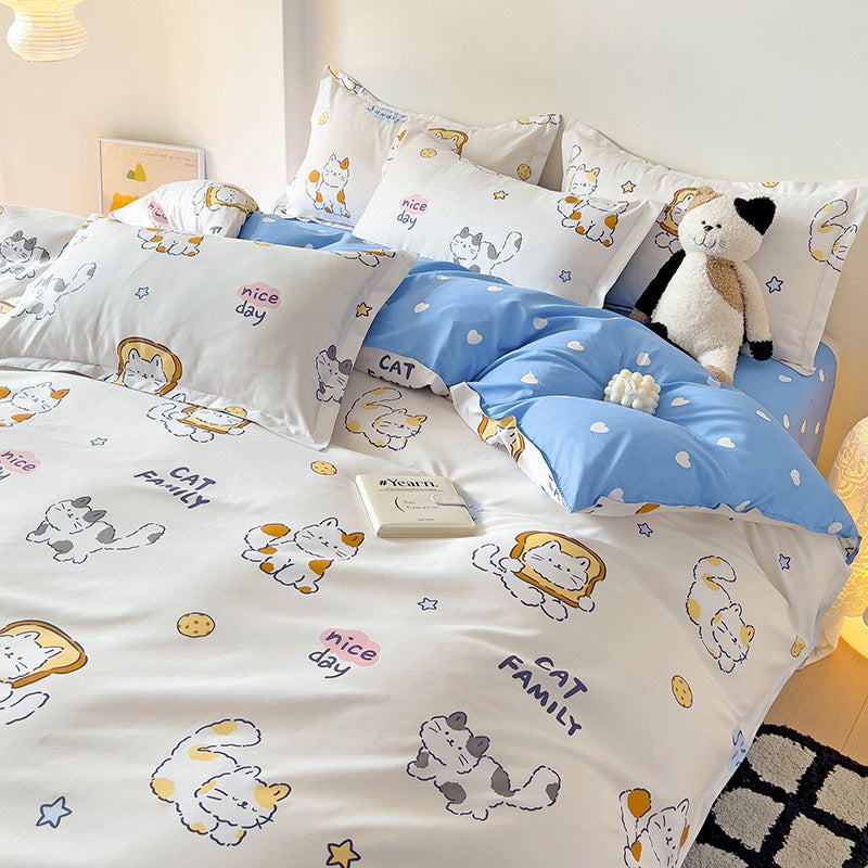 Playful cat-themed bedding set with blue pillowcases and cute designs