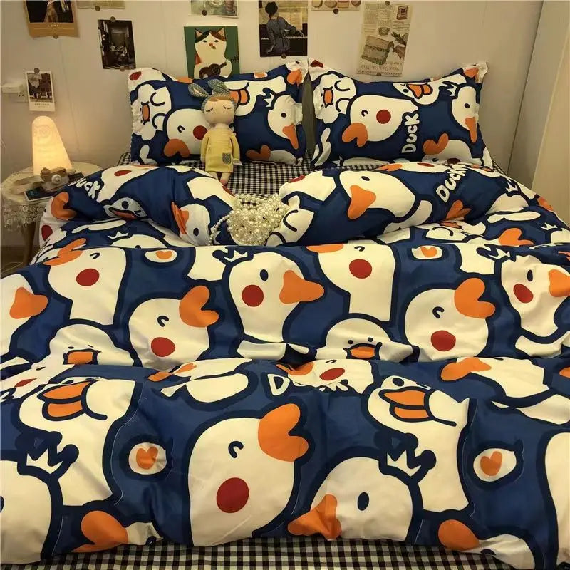 Fun blue and orange duck-themed bedding set with pillows