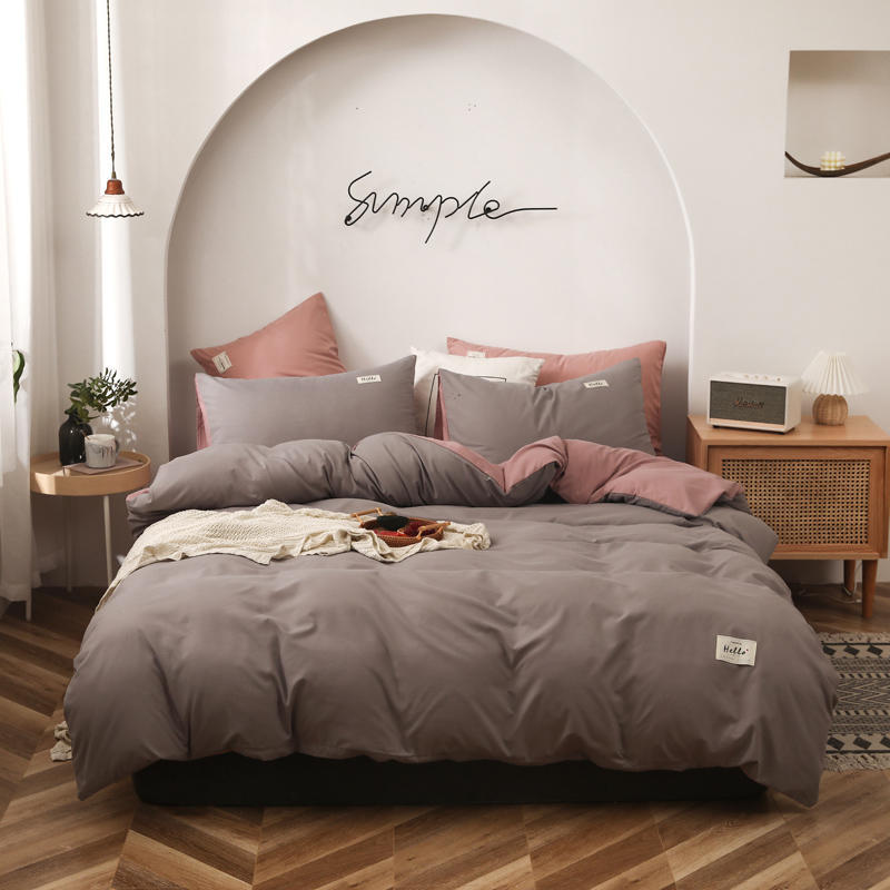 Stylish gray and pink bedding set with soft fabric and modern design