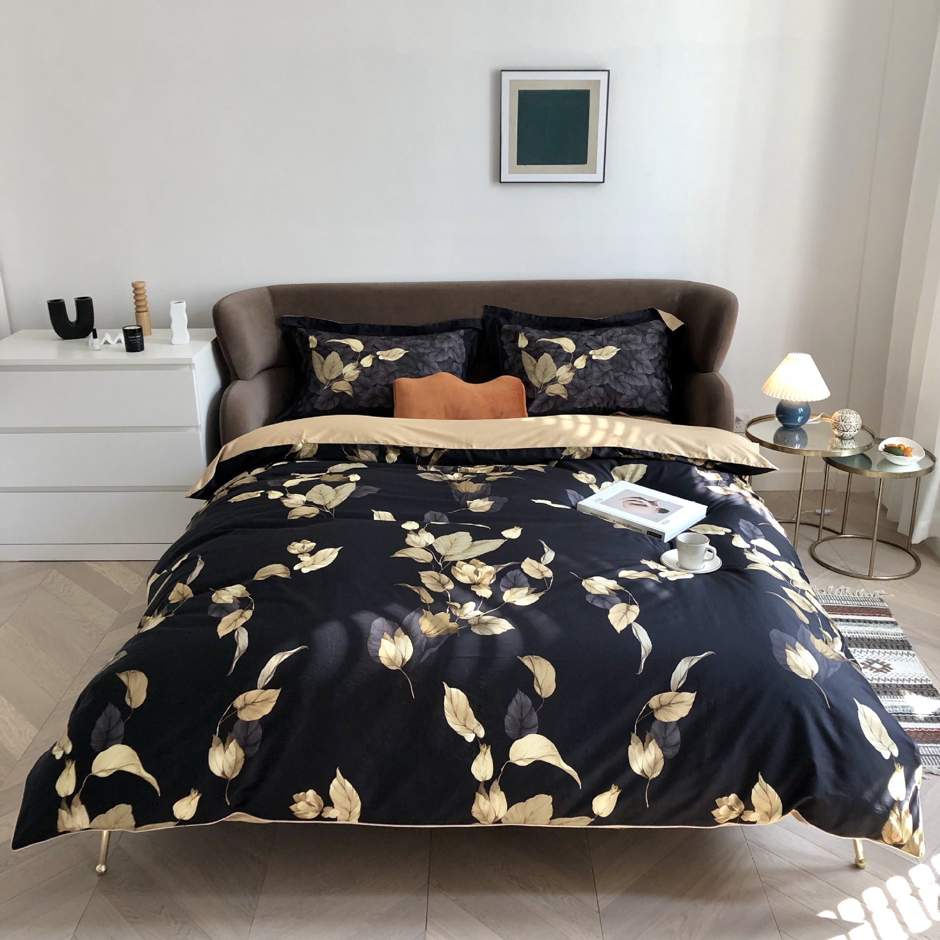 Elegant black and gold floral bedding with matching pillows