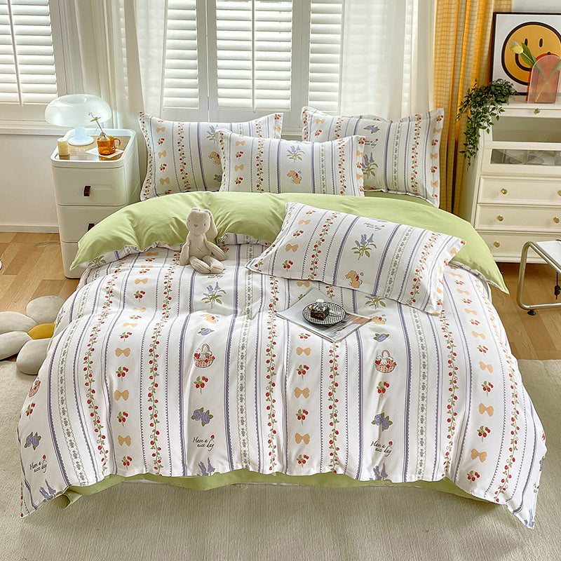 Floral striped bedding with green accents and soft designs