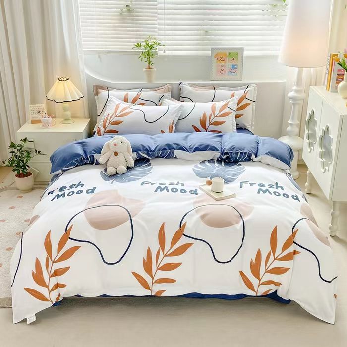 Fresh mood bedding set with orange leaves and blue accents