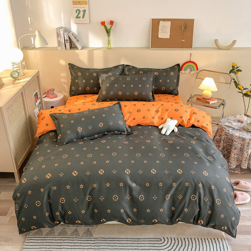 Gray and orange bedding set with floral and star patterns