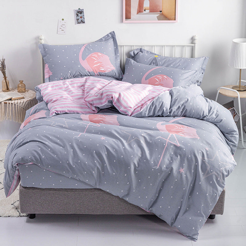 Stylish gray bedding with pink flamingo print and polka dots