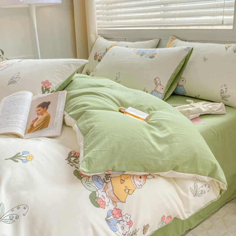 Soft green bedding set with rabbit and floral patterns