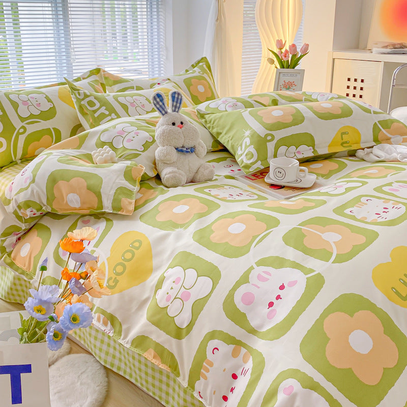 Cheerful green and yellow bedding with playful animal prints