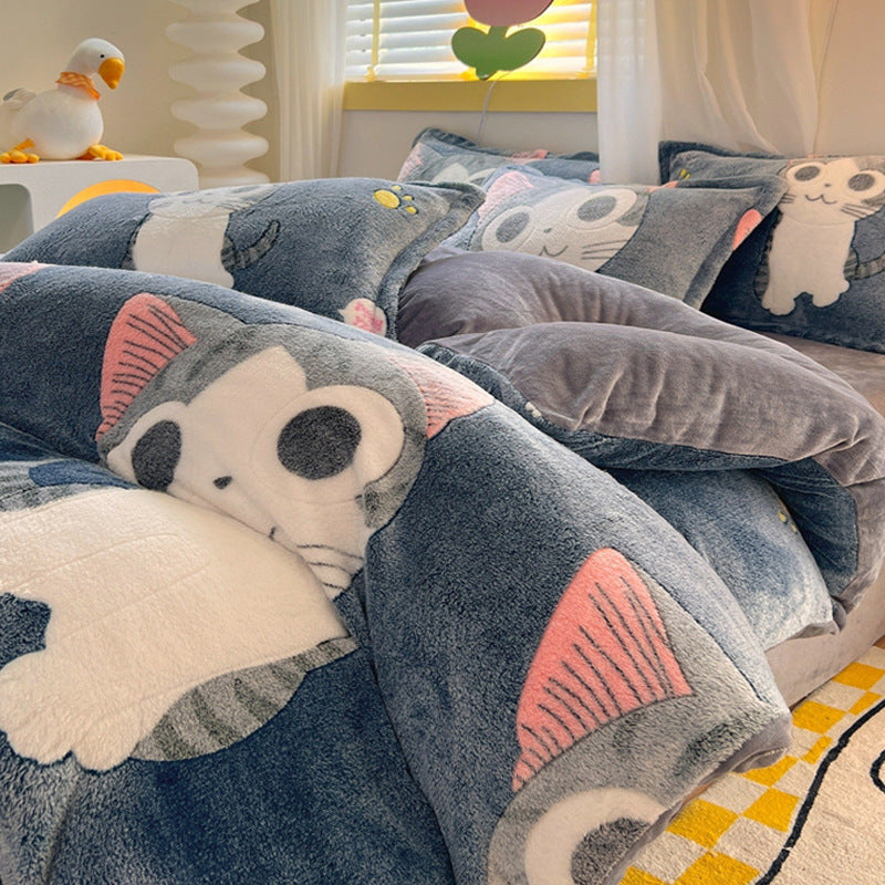 Soft plush bedding with adorable grey cat faces and paws