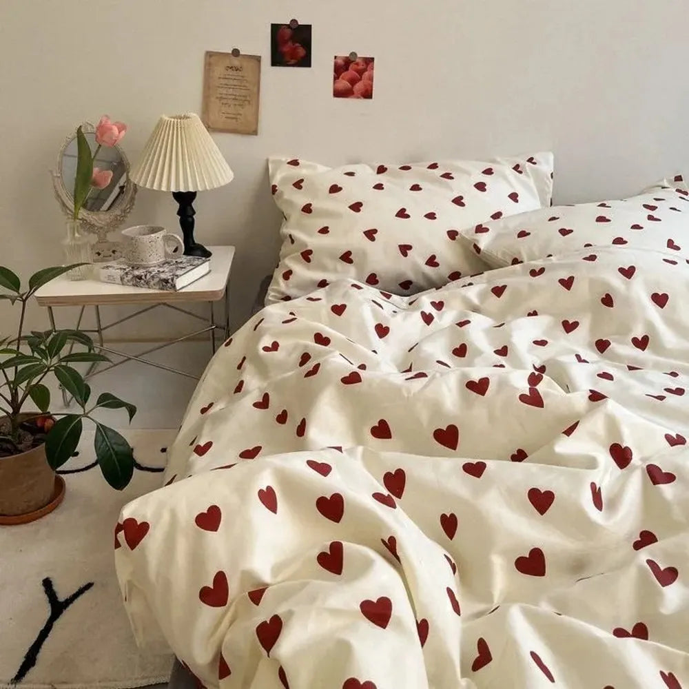 White bedding set with red heart prints, cozy and inviting design