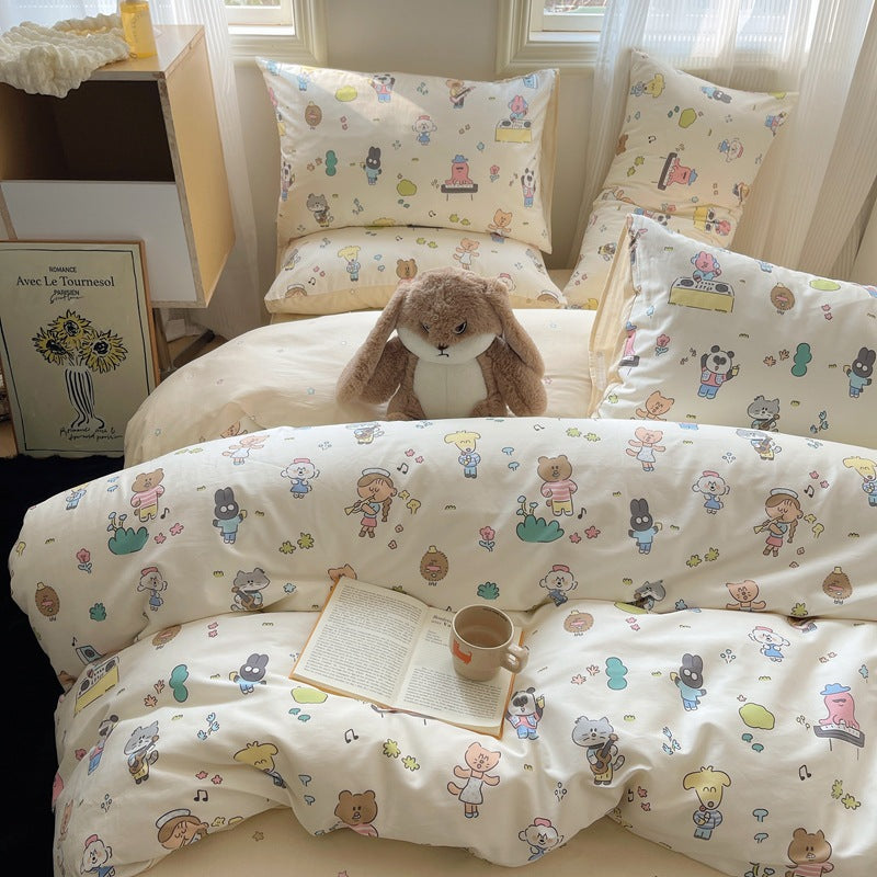 Colorful bedding with cute kids and animal drawings on beige