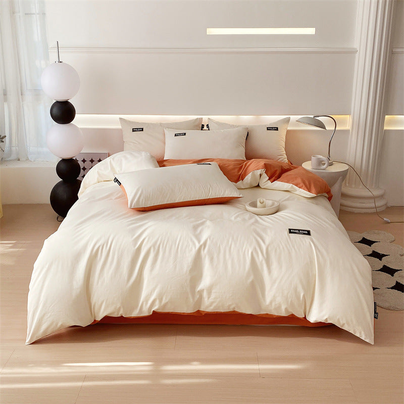 Elegant cream and orange bedding set with a modern cozy design