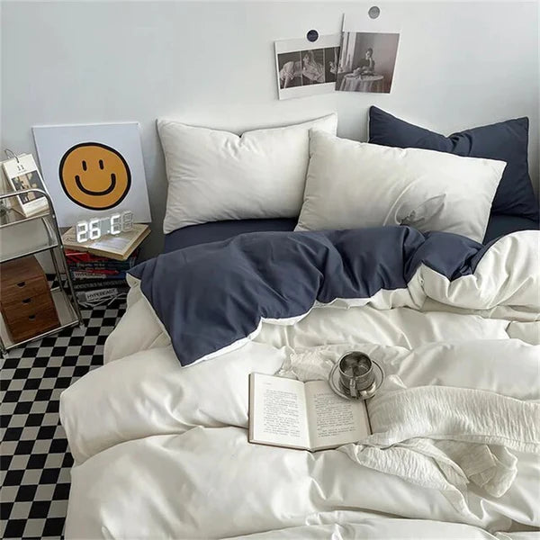 Cozy navy and white bedding set with soft pillows in modern decor