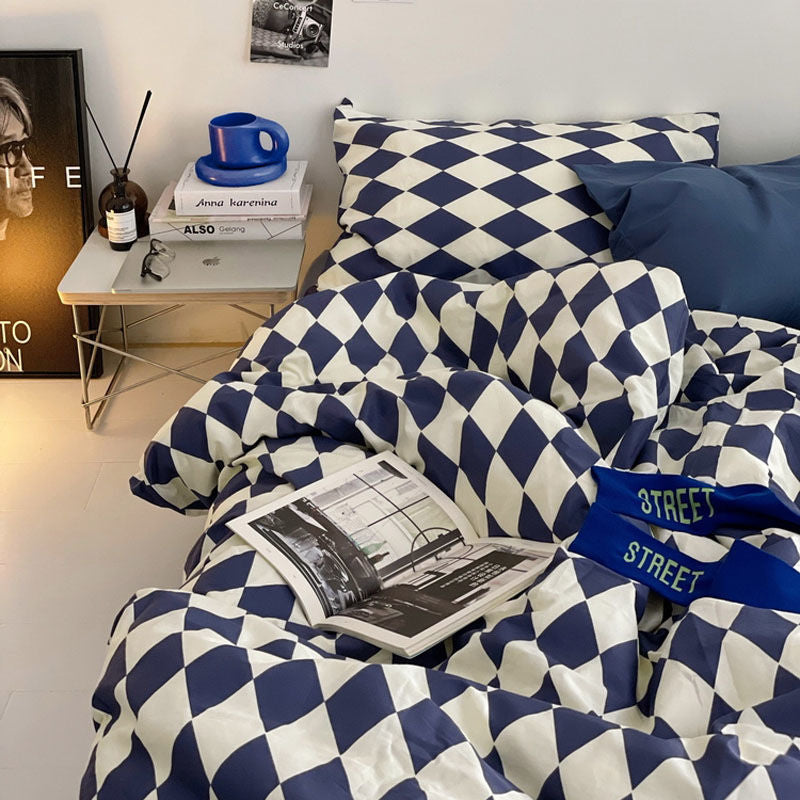 Navy and white diamond pattern bedding set with stylish accents