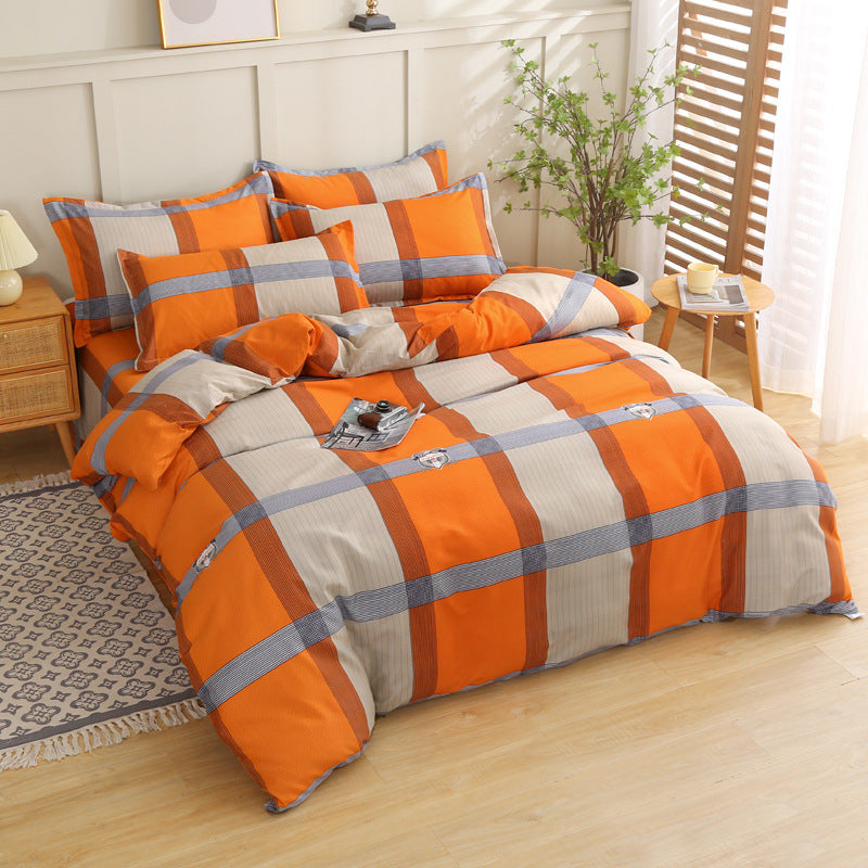 Modern bedding set with vibrant orange plaid pattern