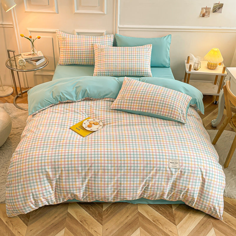 Light blue and pastel checkered bedding set with soft pillows