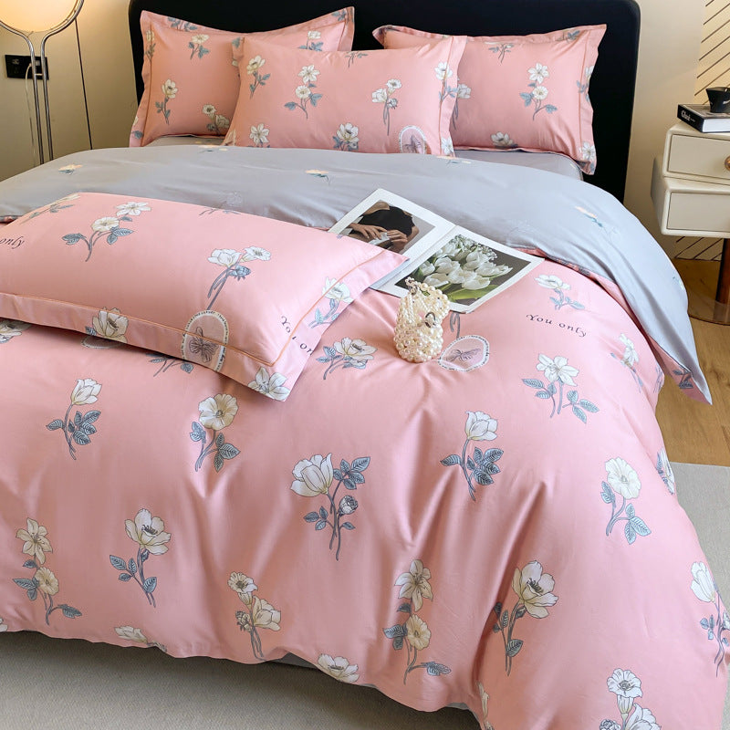 Elegant pink bedding set with floral print and grey accents