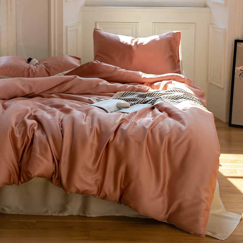 Elegant satin bedding set in rose gold with a soft sheen