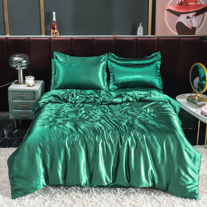 Luxurious green satin bedding set with smooth texture