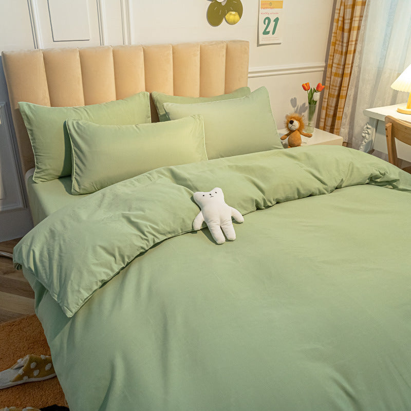 Cozy light green bedding set with soft fabric and matching pillows