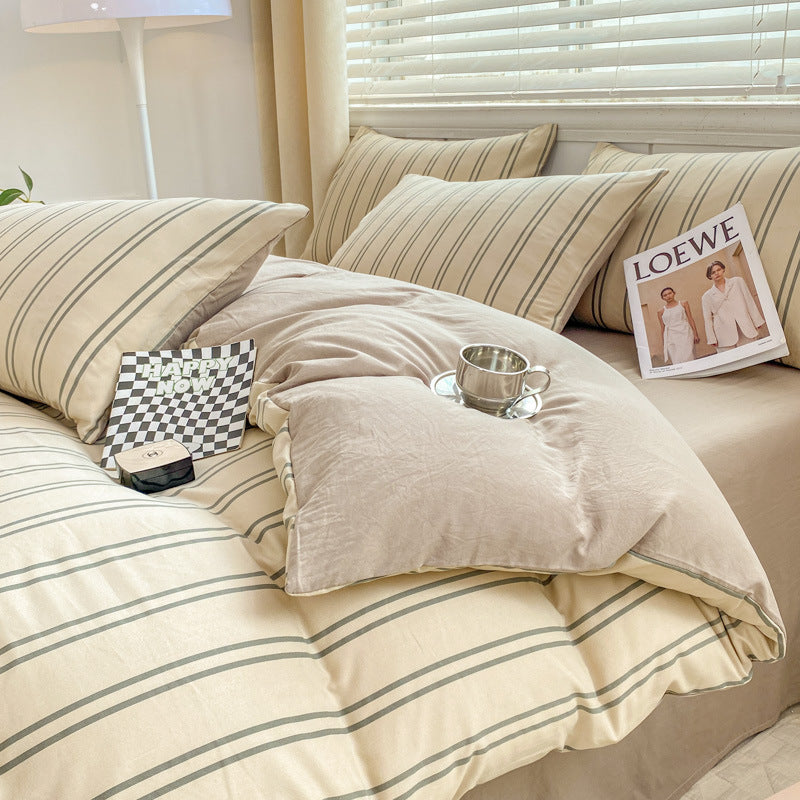 Beige and olive striped bedding set with cozy pillows and accessories