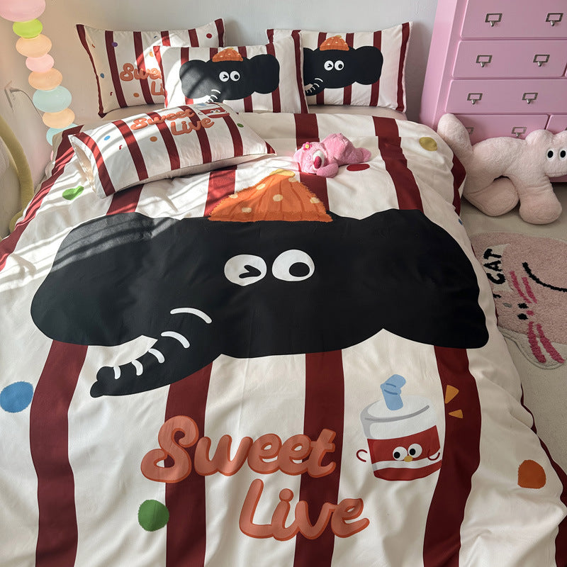 Playful striped bedding with an elephant and "Sweet Live" text