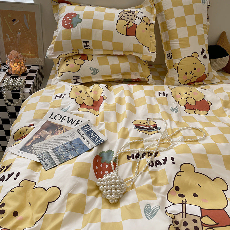 Cozy bedding set with yellow checkered pattern and bear design