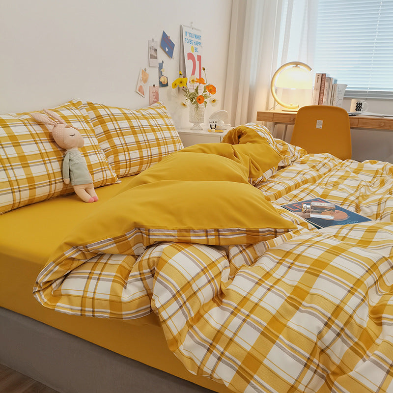 Vibrant yellow and white checkered bedding set with soft pillows