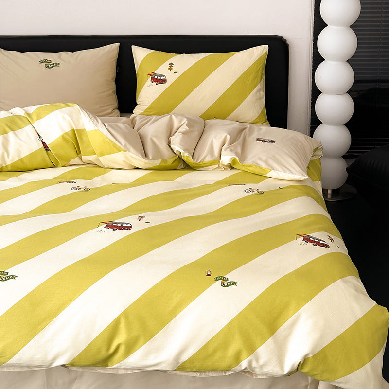 Stylish yellow striped bedding set with playful vehicle prints