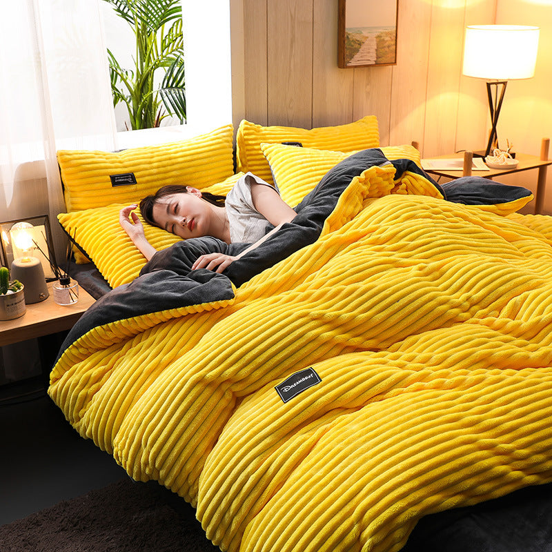 Cozy yellow fleece bedding set with dark gray accents for comfort