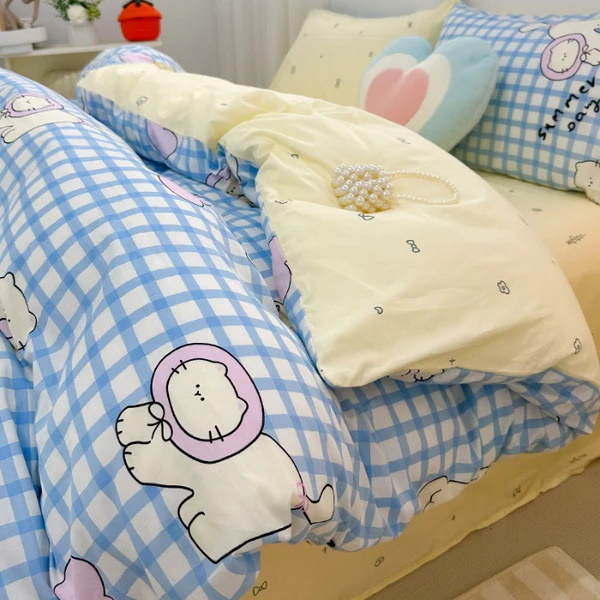 Adorable blue and yellow bedding set with checkered pattern and lions