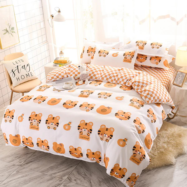 Fun orange tiger print bedding set with checkered pillow covers