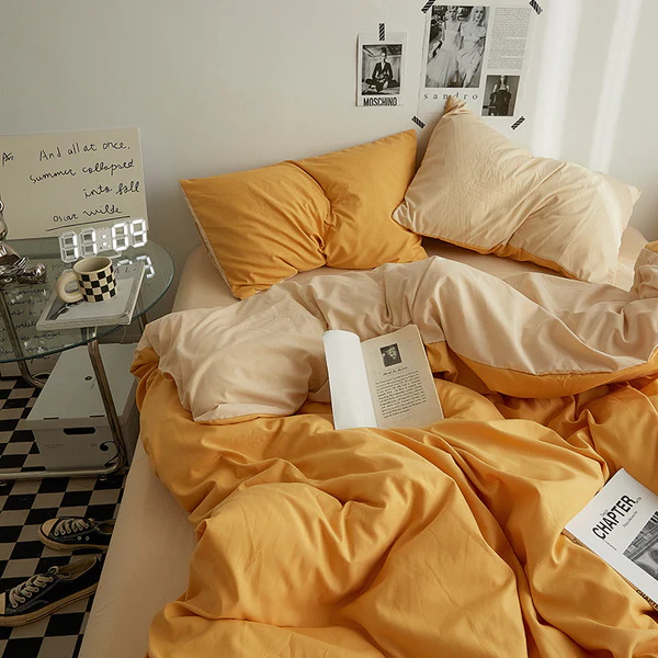 Cozy yellow and beige bedding set with pillows